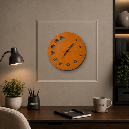 Growing Hours wooden wall clock above a desk on a taupe panelled wall